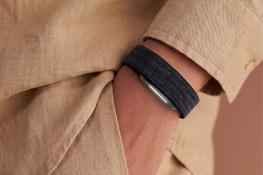 Hume Band 2.0 worn on the wrist beside a linen sleeve